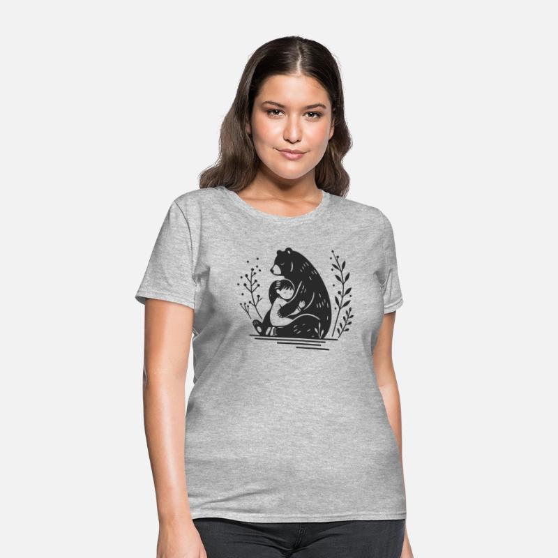 A child lovingly hugs a brown bear