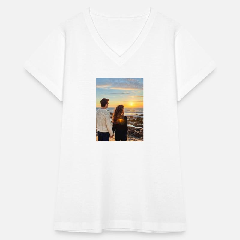 Couple Hand In Hand On Sandy Beach At Sunset